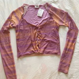 Orange and lavender blouse with mesh sleeves